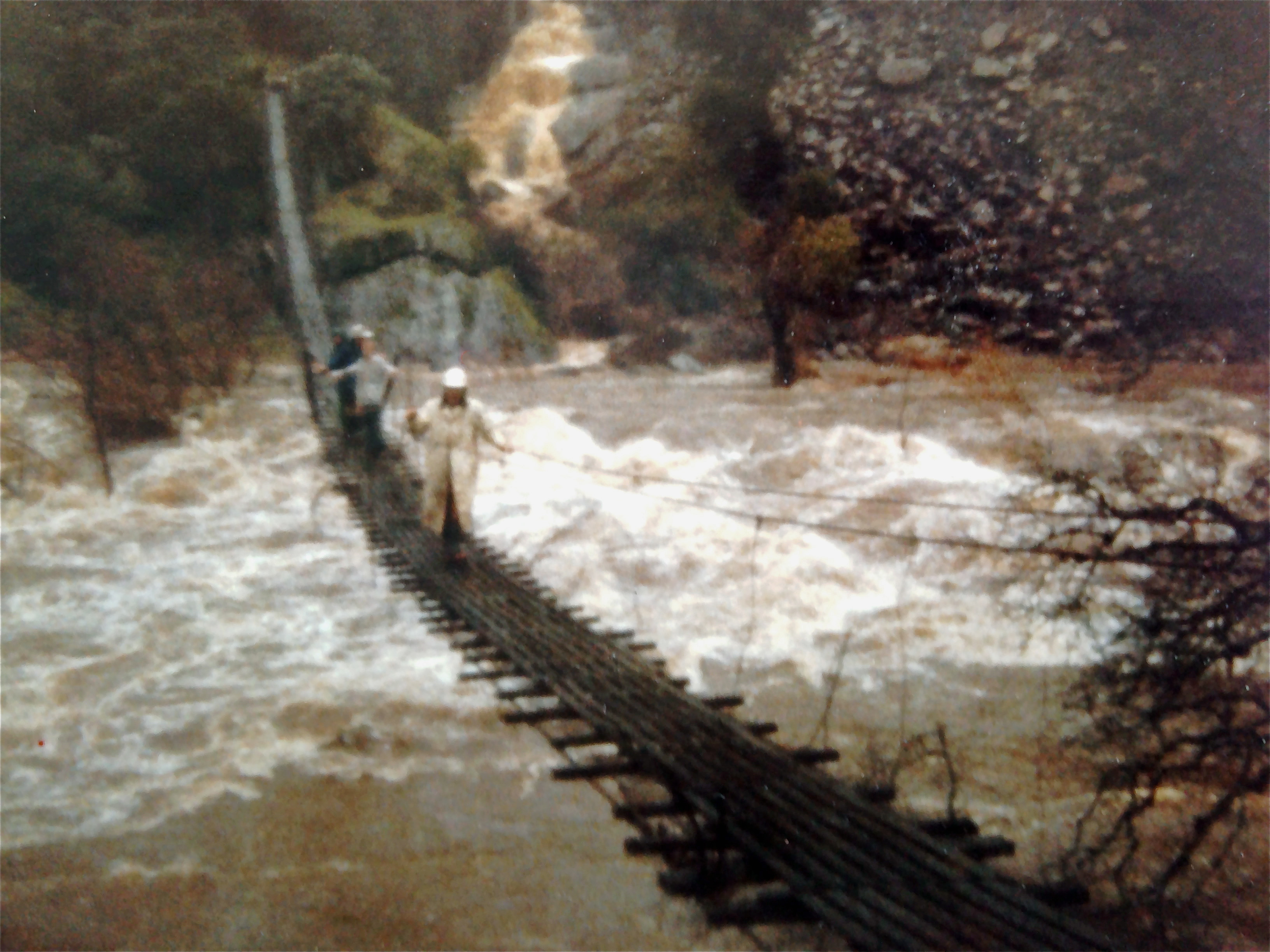 The January 1980 flood crossing Suspension Bridge 2 The Stan The Stan